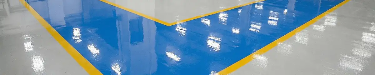 A factory floor professionally covered and marked with epoxy flooring in Dover, DE