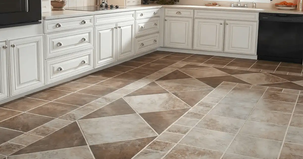 Kitchen with white cabinets and a professionally installed tile floor in Dover, DE