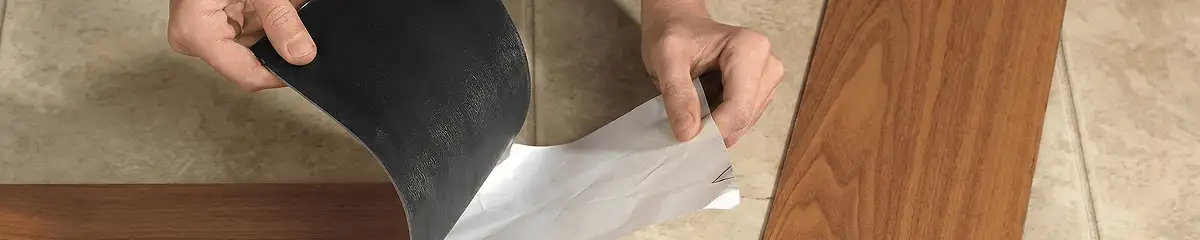 A professional installing vinyl flooring in Dover, DE